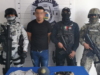 Detienen en Cancún a un hombre armado y a un menor con droga